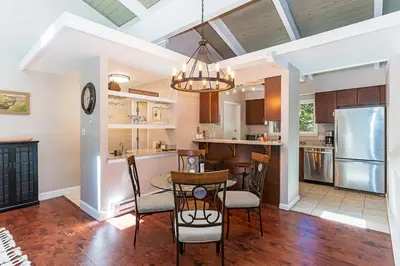 a kitchen and dining room with a table and chairs at The perfect getaway for a small group or families in Incline Village