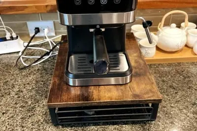 a coffee maker sitting on a wooden stand on a counter at Luna Cabin - 5BR Hot Tub A/C Game Room EV Charger in Tahoe Vista
