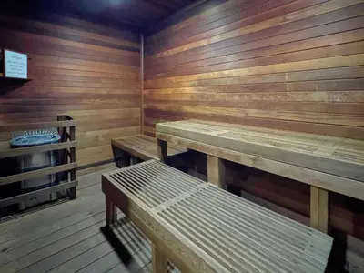 a room with wooden benches in a sauna at Lofty Retreat, Condo in Northstar in Truckee