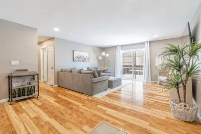 a living room with a couch and a table at Vibrant Boho Home 3 Bed Pet Friendly in Reno