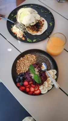 two plates of food on a table with breakfast foods at Firefall Ranch Yosemite in Groveland