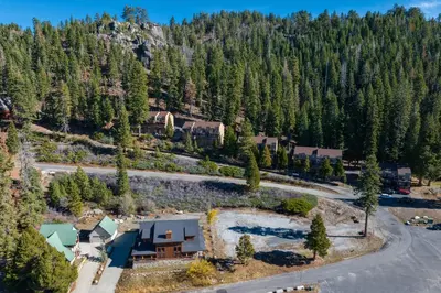 an aerial view of a house in a forest at Strawberry Townhouse Walk to Leland Snowplay! in Strawberry