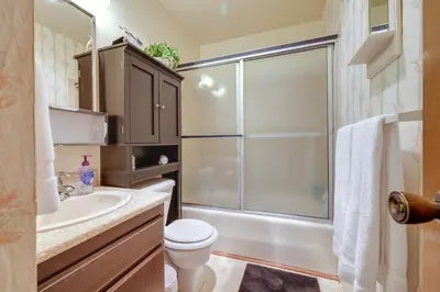a bathroom with a shower and a toilet and a sink at Strawberry Townhouse Walk to Leland Snowplay! in Strawberry