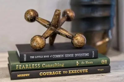 a stack of books with a bronze cross on top at Tahoe Bliss: Ski, Hike, & Relax in Incline Village