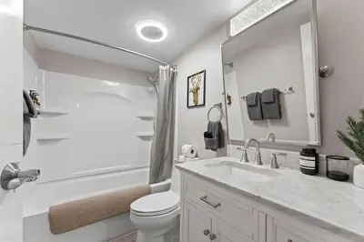 a bathroom with a sink and a toilet and a tub at Tahoe Bliss: Ski, Hike, & Relax in Incline Village