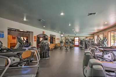 a gym with rows of treadmills and machines at Less Than 1 Mi to North Star Resort Condo with Balcony in Truckee