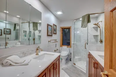 a bathroom with a sink and a shower and a toilet at 4 Mi to Slopes Family-Friendly Stateline Home! in Stateline
