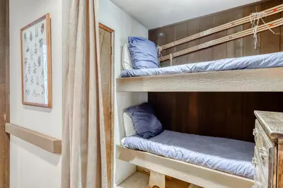 a couple of bunk beds in a room at Horizons 4 101 in Mammoth Lakes