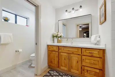 a bathroom with a sink and a mirror at Gold Bear in Truckee