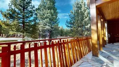 a red fence on the side of a house at Obsidian #1 home in Mammoth Lakes