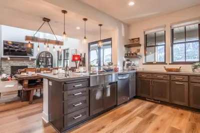 an open kitchen with a large island in the middle at Creekhouse 1364 in Mammoth Lakes