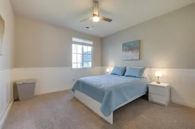 a bedroom with a bed and a ceiling fan at Stylish Lodi Wine Country Retreat with Private Patio in Lodi