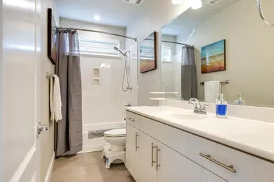 a bathroom with a sink and a toilet and a shower at Stylish Lodi Wine Country Retreat with Private Patio in Lodi