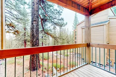 a balcony of a house with a tree at Northstar Nirvana in Truckee