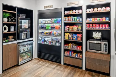 a store with a refrigerator and a microwave at Courtyard by Marriott Modesto North in Modesto