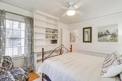 a bedroom with a bed and a ceiling fan at Less Than 1 Mi to Midtown Pet-Friendly Home in Reno! in Reno