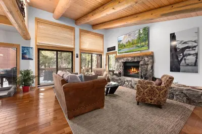 a living room filled with furniture and a fireplace at Rocky Point # 14 Palisades Townhome - Ski Shuttle w Tennis! in Olympic Valley
