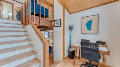 an office with a desk and stairs in a tiny house at In Northstar Ski Resort Game Room Family-Friendly Dakine Haus by AvantStay in Truckee