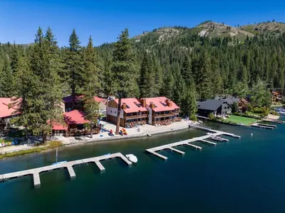 an aerial view of a resort on a lake at Striking Queen Deluxe Studio w/Kitchenette #114 at Donner Lake Village in Truckee