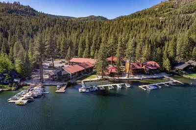 an aerial view of a marina with boats in the water at Spacious Condo w/Lake View #247 at Donner Lake Village in Truckee