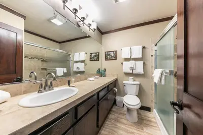 a bathroom with a sink and a toilet at Spacious Condo w/Lake View #247 at Donner Lake Village in Truckee