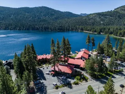an aerial view of a resort with a lake at Charming Deluxe Studio w/Lake View #246 at Donner Lake Village in Truckee
