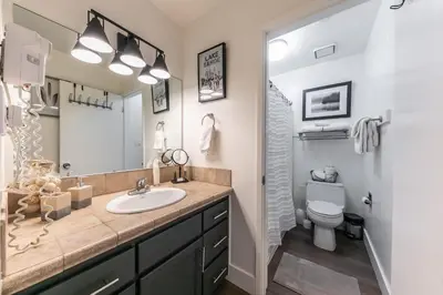 a bathroom with a sink and a toilet at Charming Deluxe Studio w/Lake View #246 at Donner Lake Village in Truckee