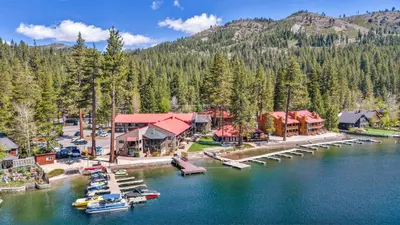 an aerial view of a marina with boats in the water at Inviting King Deluxe 1 BR Condo W/Lake view #141 at Donner Lake Village in Truckee