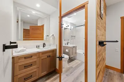a bathroom with a sink and a toilet at Palisades Tahoe Lodge Rentals Premium Two Bedroom #700 in Olympic Valley