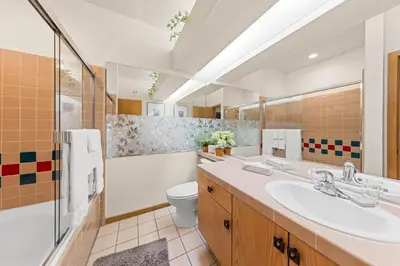 a bathroom with a sink and a toilet at Palisades Tahoe Lodge Rentals Studio #146 in Olympic Valley