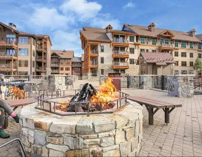 a fire pit in a courtyard in a resort at Slope Side Studio in Northstar Village! in Truckee