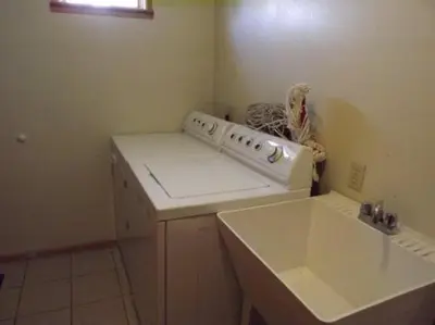 a kitchen with a white stove and a sink at Rr-june Lake Lodge in June Lake