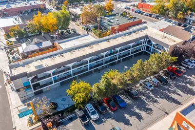 an overhead view of a parking lot next to a building at Midtown Getaway: Trendy Studio Heart of Reno in Reno