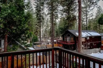 a train yard with a house in the woods at Family Friendly 3BD-Next to Beach & Ski Resort in Kings Beach