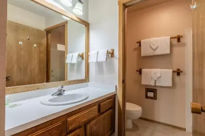 a bathroom with a sink and a toilet at Snowcreek #309 2 Plus Loft, 2 Bathroom Condo Sleeps 8 People with Amazing Mountain Views in Mammoth Lakes