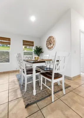 a white dining room with a white table and chairs at 4 Mil to Sequoia NTL Park Private River Access in Three Rivers