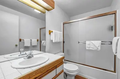 a bathroom with a sink and a toilet at Sierra Cabin Condo – Sun Meadows 1 BedroomLoft condo in Kirkwood