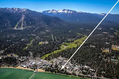 an aerial view of a city and a mountain at Sierra Shores Five - Lakefront Comfort in South Lake Tahoe