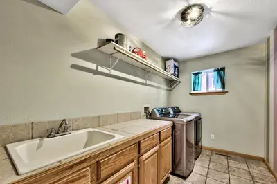 a kitchen with a sink and a dishwasher at Heavenly Retreat in South Lake Tahoe