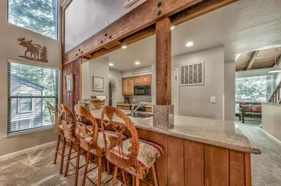 a kitchen with a center island with a counter top at Lakeland Village 410 in South Lake Tahoe