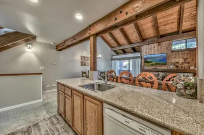 a kitchen with a sink and a counter at Lakeland Village 410 in South Lake Tahoe