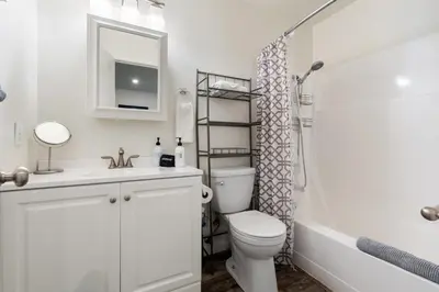 a bathroom with a toilet and a sink and a shower at Private/Cozy Kings Beach Retreat in Tahoe Vista