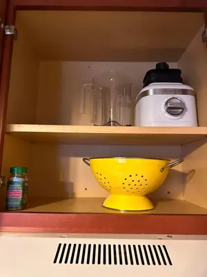 a yellow bowl on a shelf in a kitchen at Yosemite Condominium Loft unit -B202 in Yosemite West