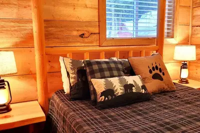 a bedroom with a bed with pillows and a window at Sequoia Splendor, inside Kings Canyon NP by Visitors Center in Wilsonia