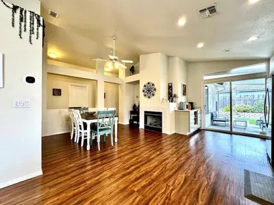 a dining room and living room with a table and chairs at King Bed Retreat, Pet-Friendly, Rancho Cordova in Rancho Cordova