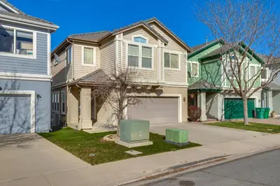 a house with a television in front of a street at Theater Room, Fireplace Home 5 Mi to Dtwn Reno! in Sparks