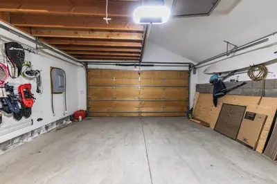 a garage with a room with wooden doors at Bright 5BD Alpine Retreat - 5Min to Alpine Meadows in Tahoe City