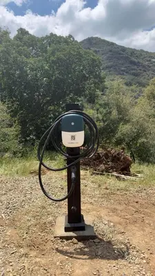a light on a pole in the middle of a field at Paradise Ranch Inn - Abundance Tent in Three Rivers