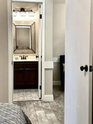 a bathroom with a sink and a mirror at Rustic Modern Condo - Close to Village - Sleeps 10 in Mammoth Lakes