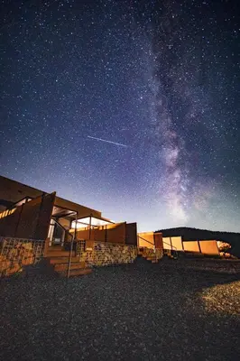 a starry night with the milky way in the sky at Horizon by Yosemite in Midpines
